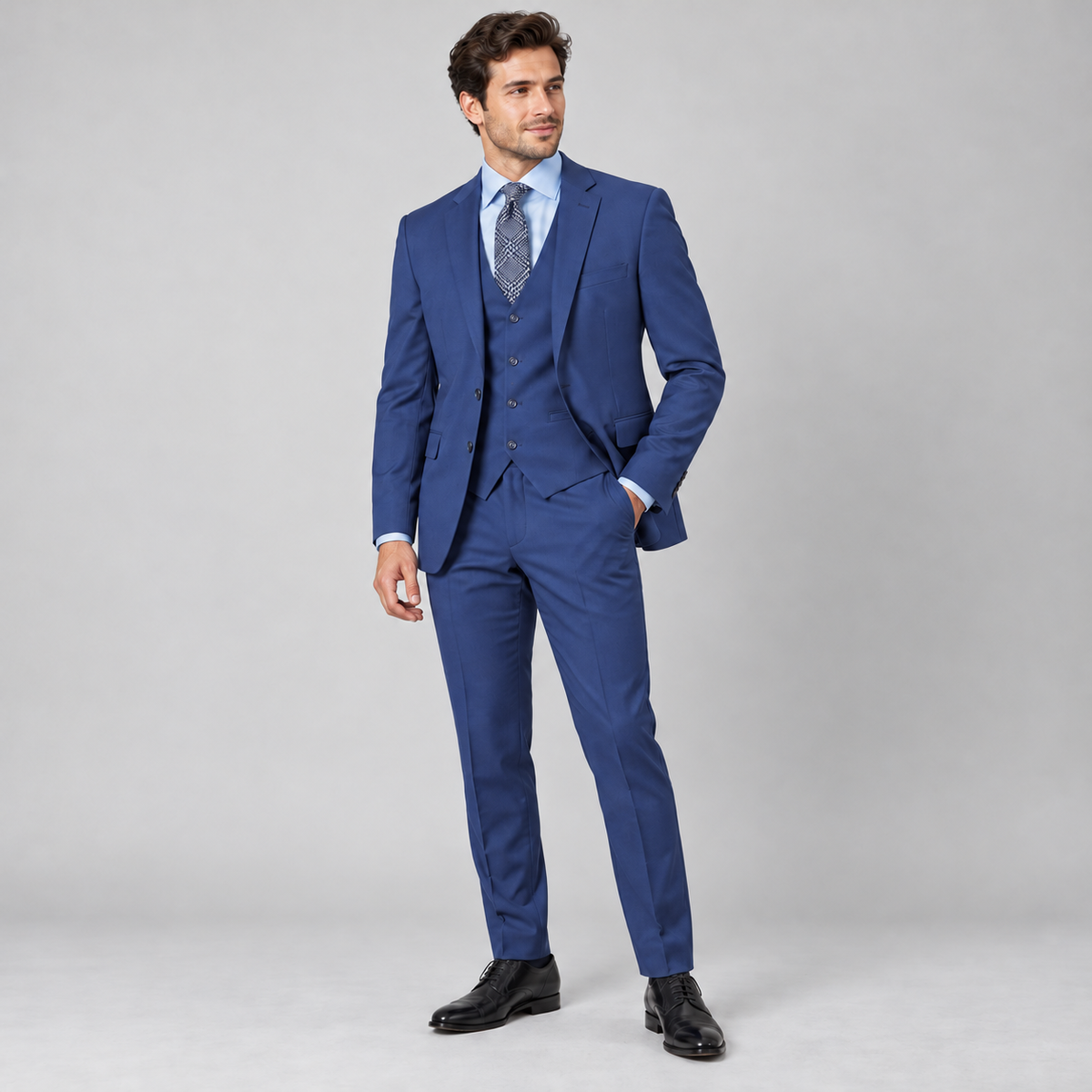 Blue three-piece slim fit suit, model view