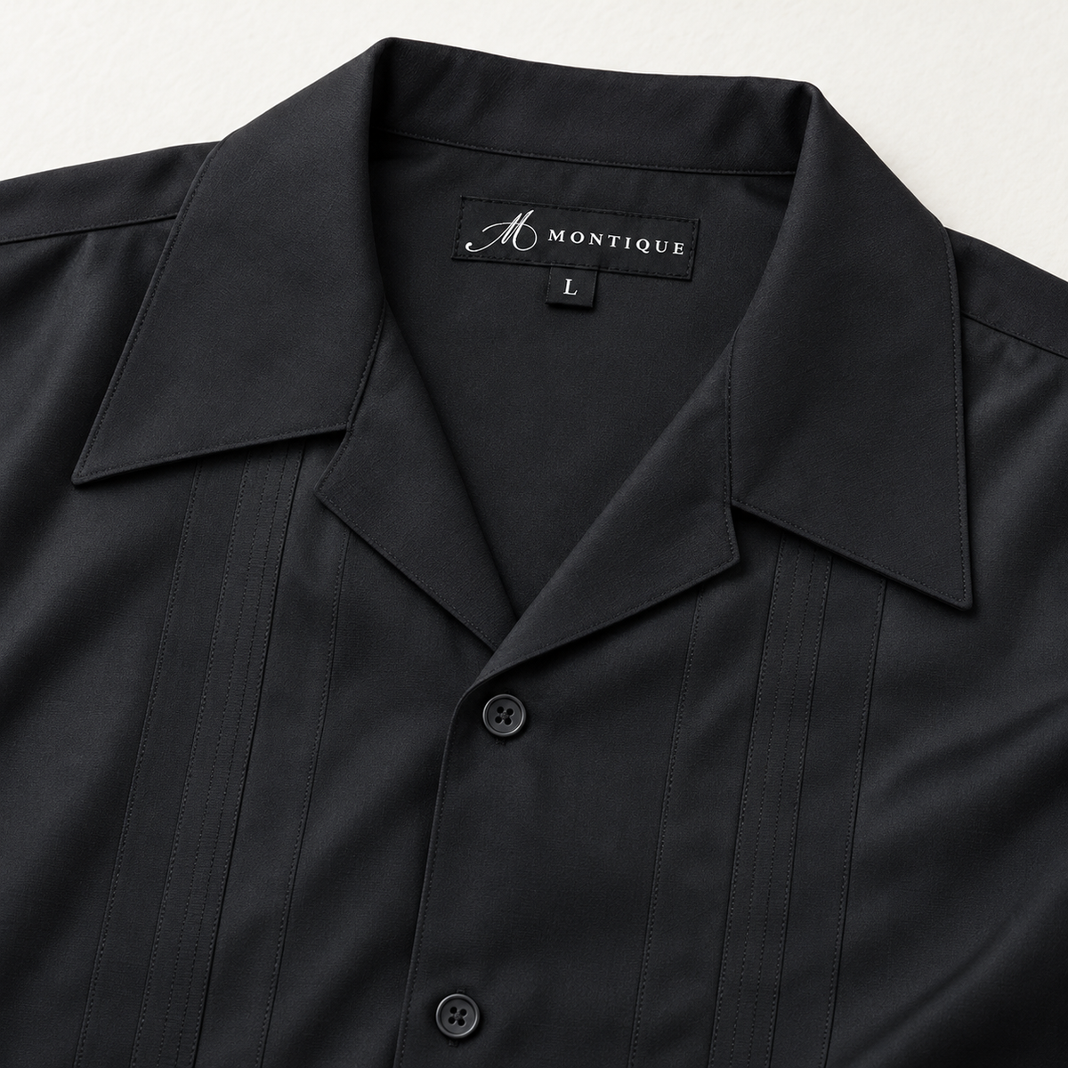 Montique black vertical panel walking suit open collar label detail