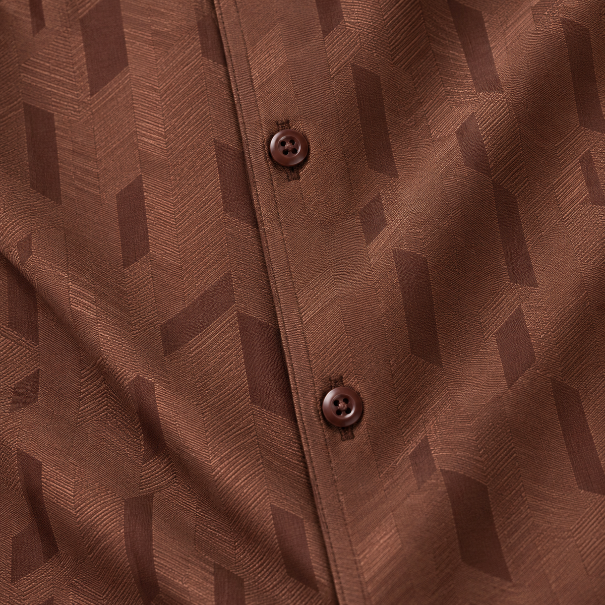 Montique brown geometric walking suit fabric, pattern and button detail