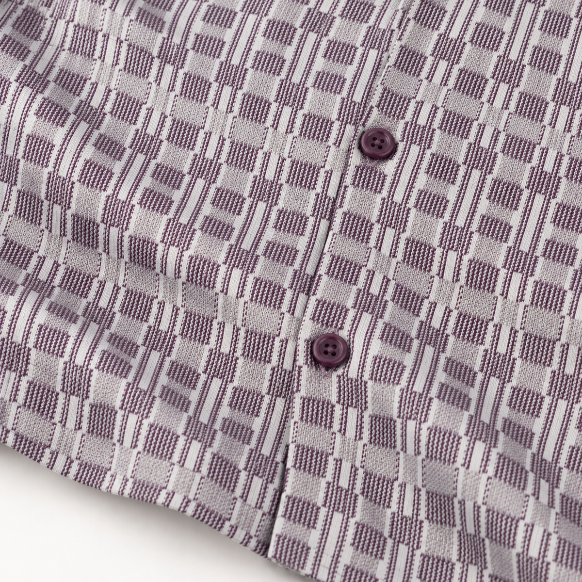 Montique plum geometric walking suit patterned fabric and matching button detail