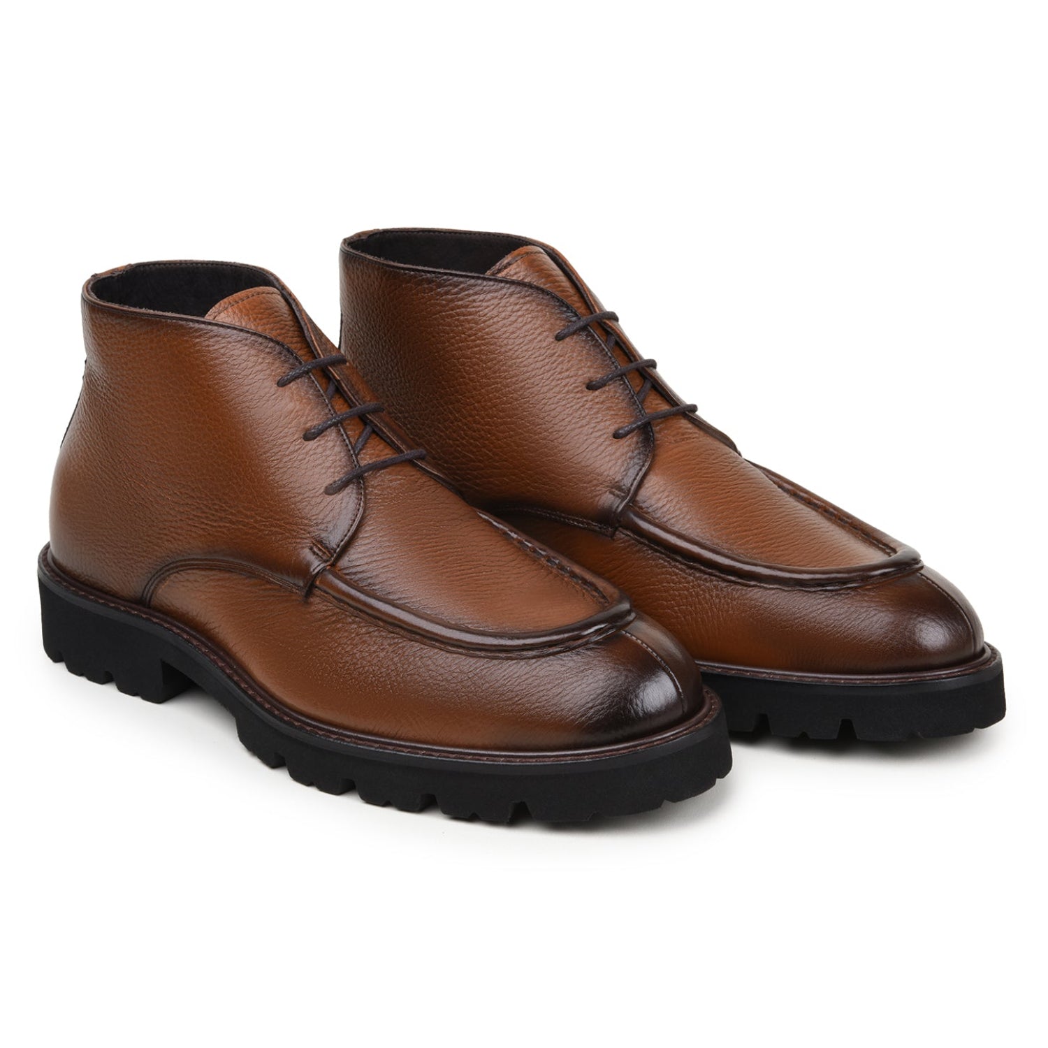 Pair of antique tan hornback and calfskin chukka boots