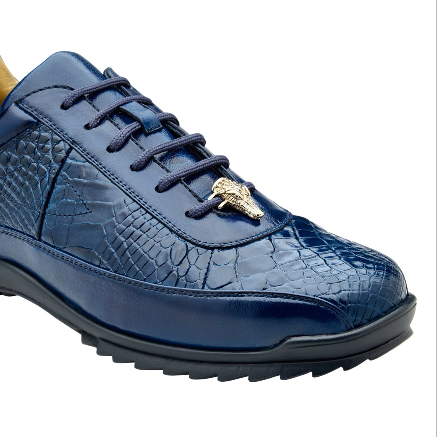 Close side view of indigo alligator leather sneaker