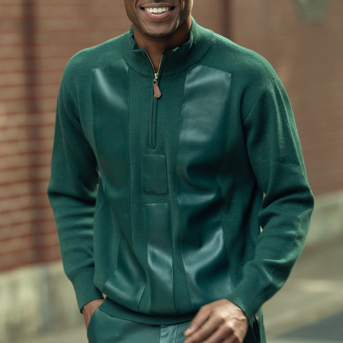 Detail of Hunter faux leather panels, quarter zip and ribbed trim on Montique SW-104 sweater