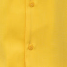 Close-up of gold 100% polyester fabric showing the solid texture and button detail