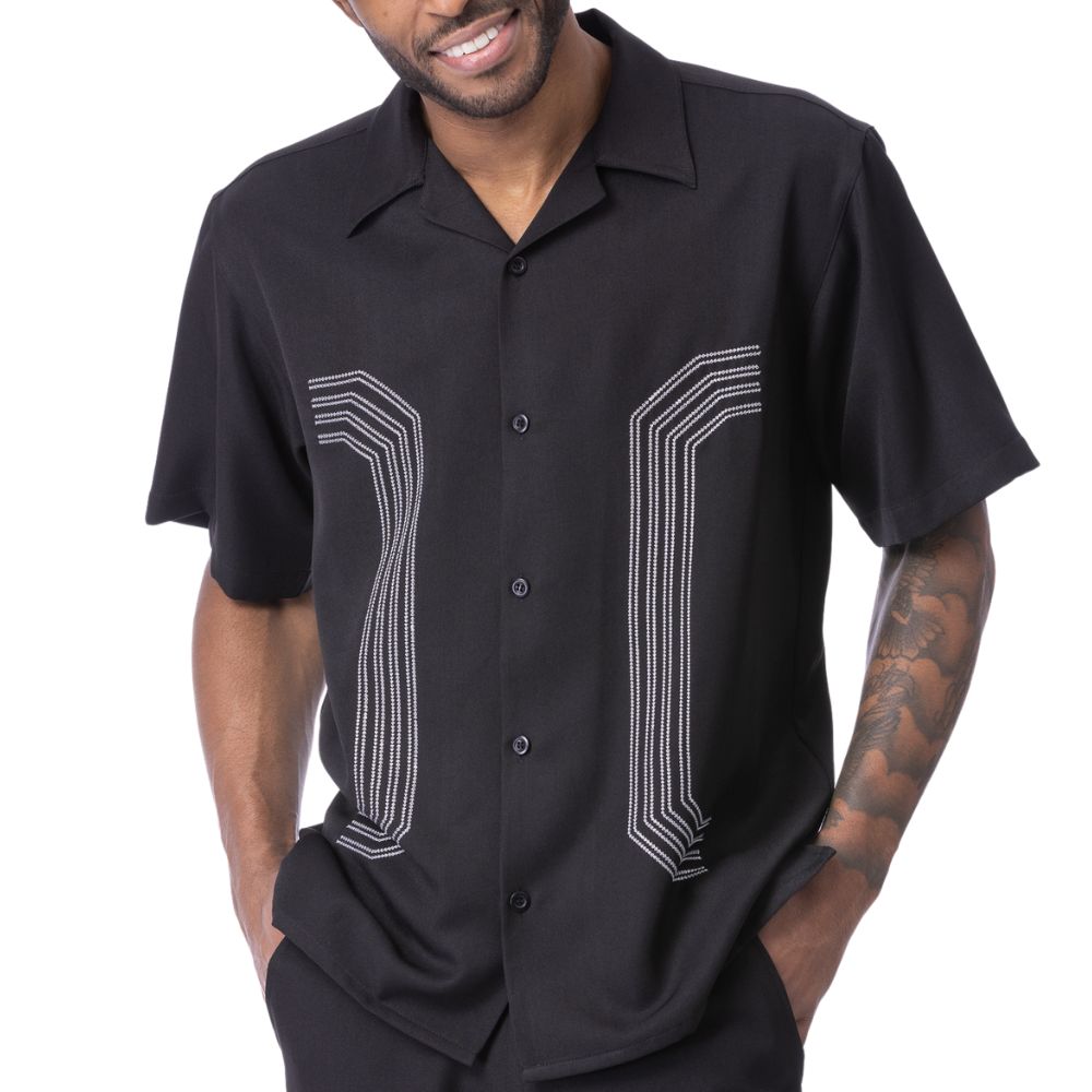 Close up of embroidered panel detail on black walking suit shirt