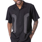 Close up of embroidered panel detail on black walking suit shirt
