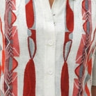 Close-up of Stacy Adams walking suit shirt showing the red geometric knit texture and button details
