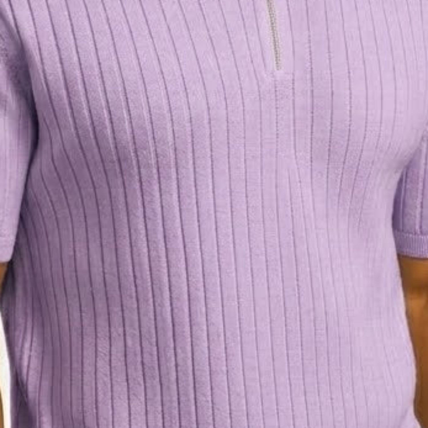 Close-up of the lavender Stacy Adams knit polo showing the vertical textured pattern and quarter-zip hardware
