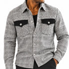 close-up of black and grey glen plaid jacket with contrasting chest flap pockets by Stacy Adams