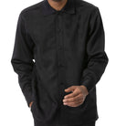 Close-up of black tone-on-tone block pattern long sleeve walking suit by Montique