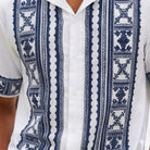 Close-up of white embroidered short sleeve walking suit shirt by Stacy Adams