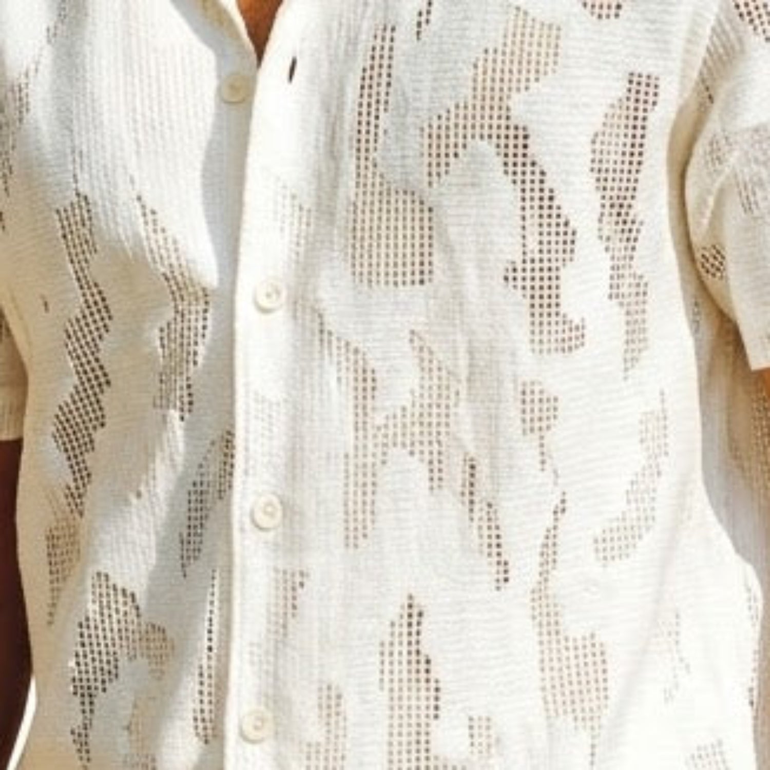 Close-up of white textured tonal fabric on Stacy Adams short sleeve shirt
