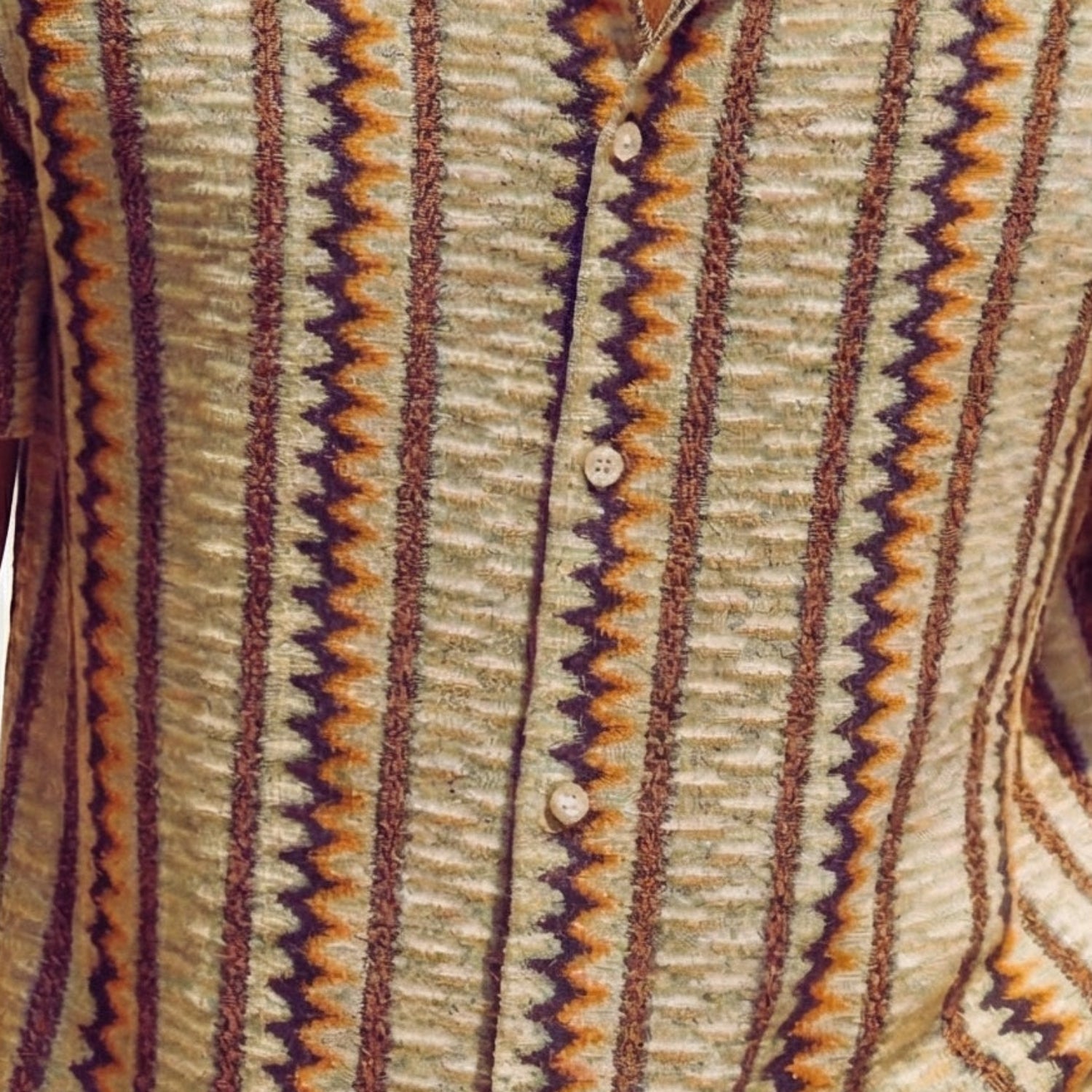 Close-up of multicolor vertical zig zag stripe fabric on Stacy Adams short sleeve shirt