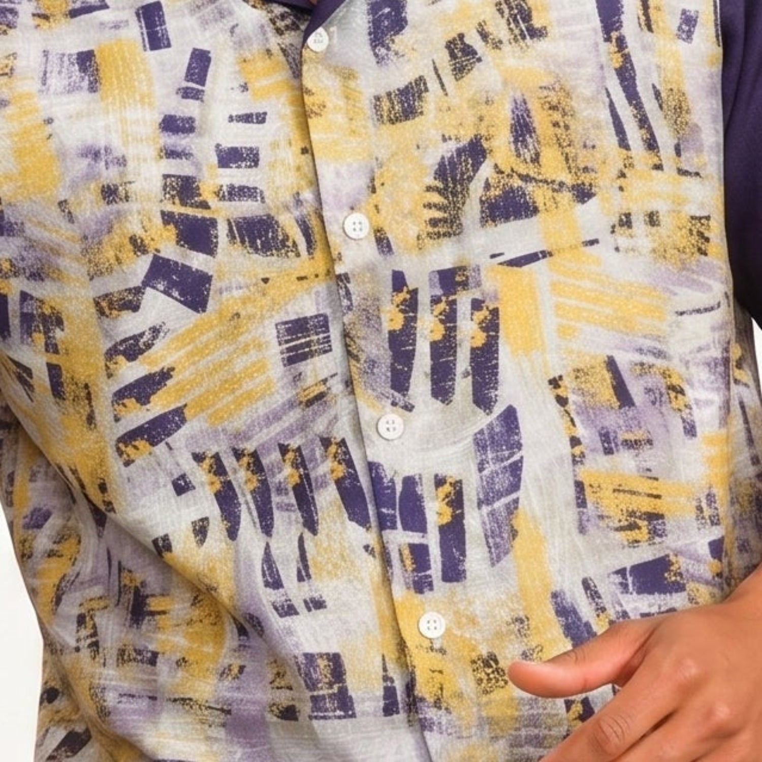 Close-up of purple abstract print short sleeve walking suit shirt by Stacy Adams