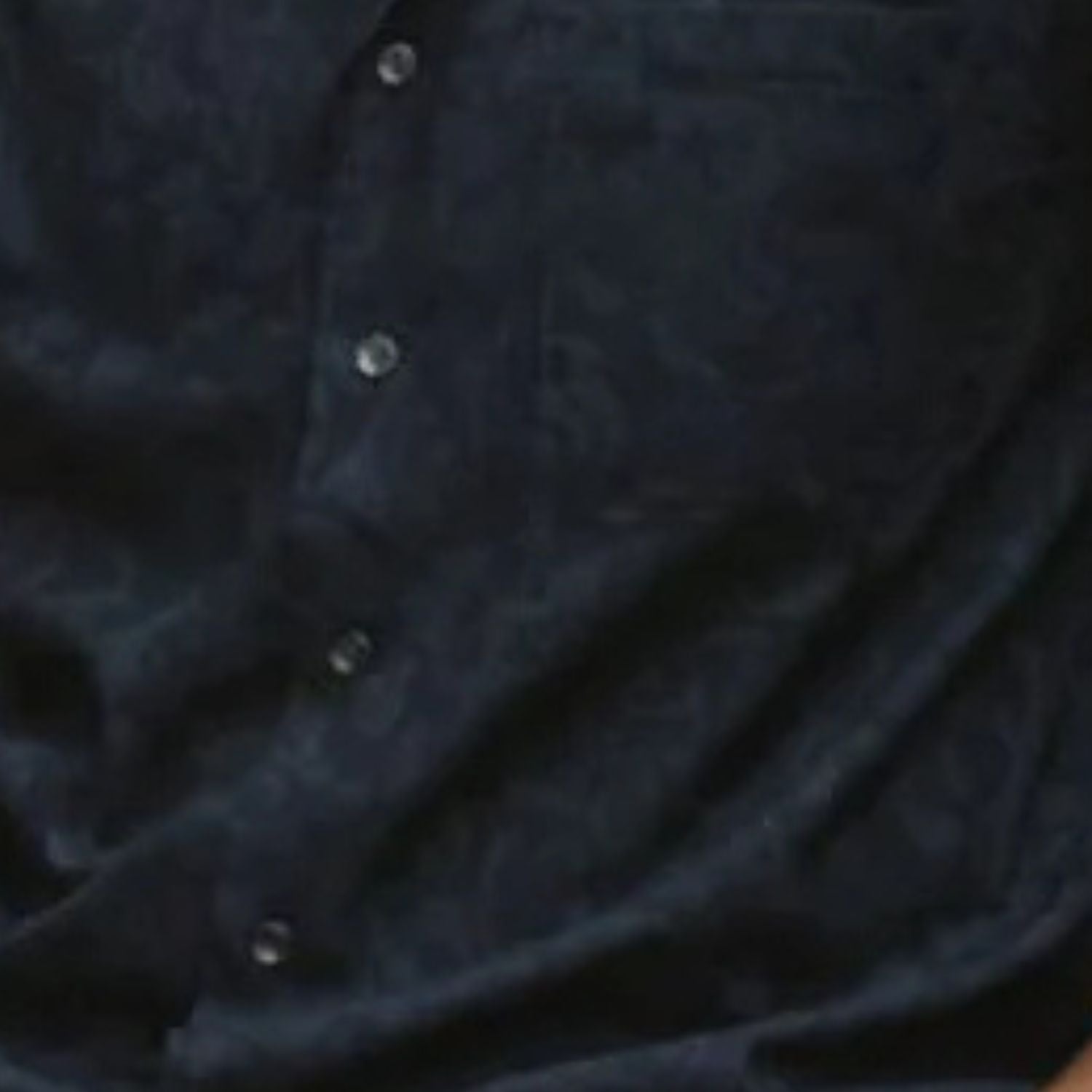 black tonal scroll textured knit fabric detail