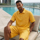 yellow textured knit polo and shorts set by stacy adams
