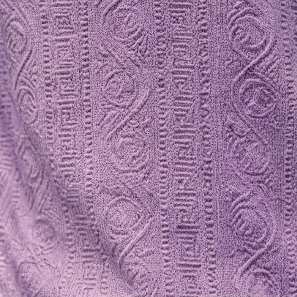 Close-up of a textured lavender fabric with a subtle pattern