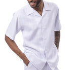 Detail view of the white textured fabric on the Montique Altavian Collection walking suit.