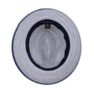 Navy and white Montique fedora inside view showing woven interior, navy sweatband, and striped brim detail