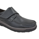 close-up of black men’s easy fasten casual shoe with touch strap