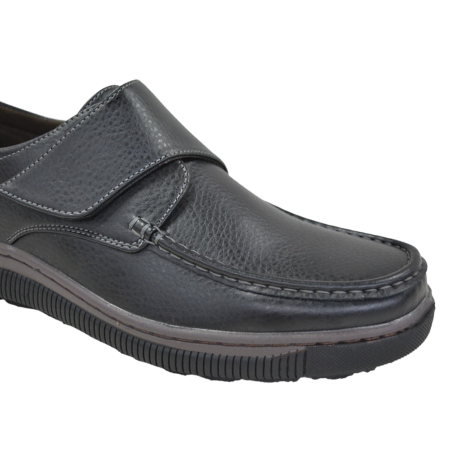 close-up of black men’s easy fasten casual shoe with touch strap