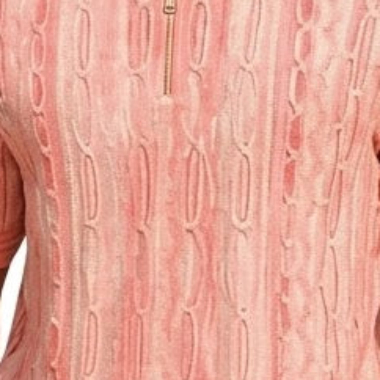 Close-up of pink wavy textured knit walking suit shorts set fabric detail