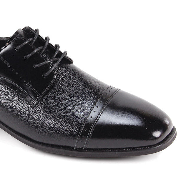 black leather dress shoes side view cap toe design