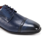 navy leather dress shoes side view cap toe design