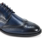 navy dress shoes with perforated wingtip detailing