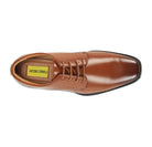 Four-eyelet lacing and smooth synthetic upper on men’s dress shoe