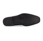 Synthetic rubber outsole of men’s plain-toe dress shoe