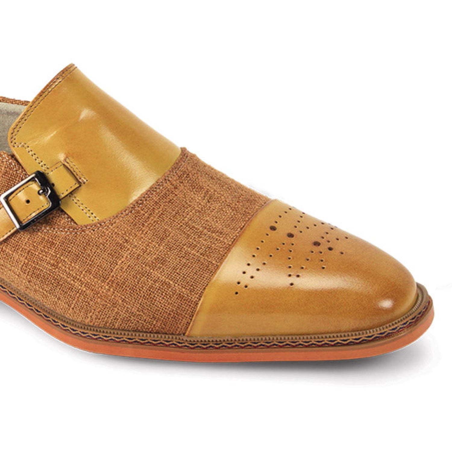 close-up of scotch and tan cap toe buckle dress shoe