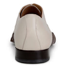Back view of light bone leather Oxford shoe
