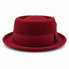 burgundy pork pie wool felt hat by Montique front view with grosgrain bow and multicolor feather accent