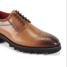 Side view of peanut leather derby shoe with four-eyelet lacing
