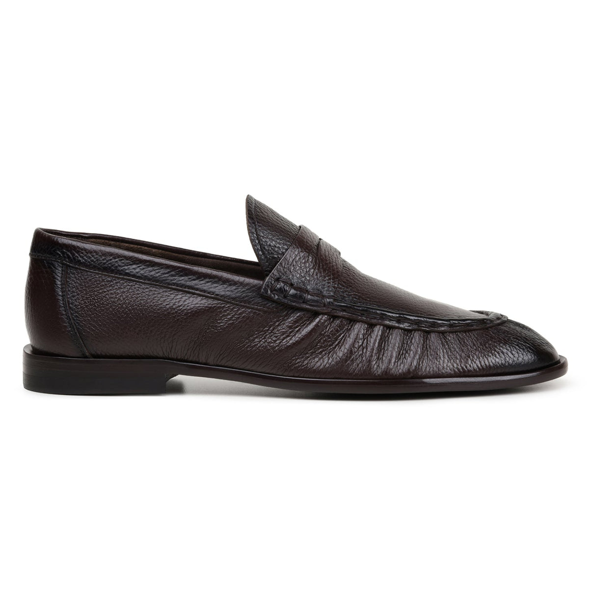 Side view of brown Italian deerskin penny loafer