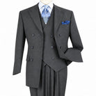 Three-quarter view of men’s charcoal three-piece double-breasted suit showing the peak lapels, vest and ticket pocket