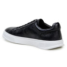 Inner side of black Belvedere deerskin sneaker