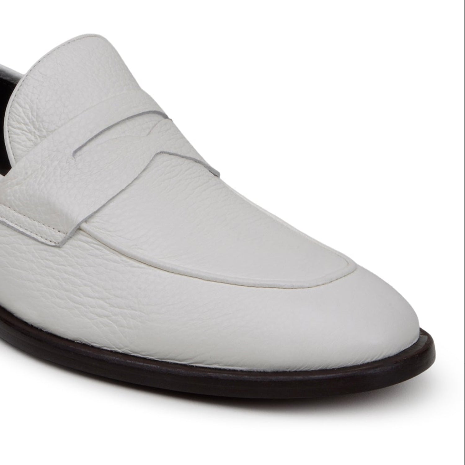 white deerskin slip-on penny loafer top and angled view