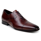 Angled view of antique cognac Italian calf leather Maestro Oxford by Belvedere