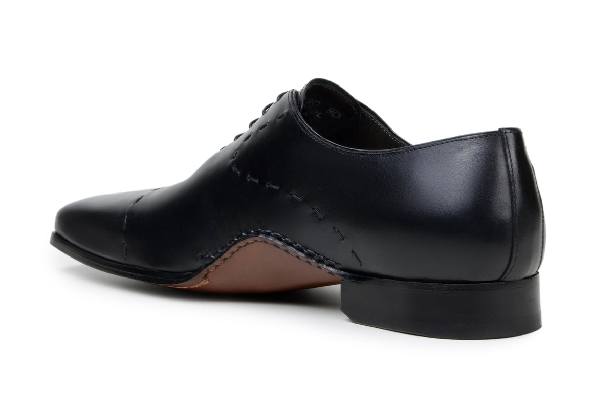 Rear three-quarter view of black calf leather Maestro Oxford