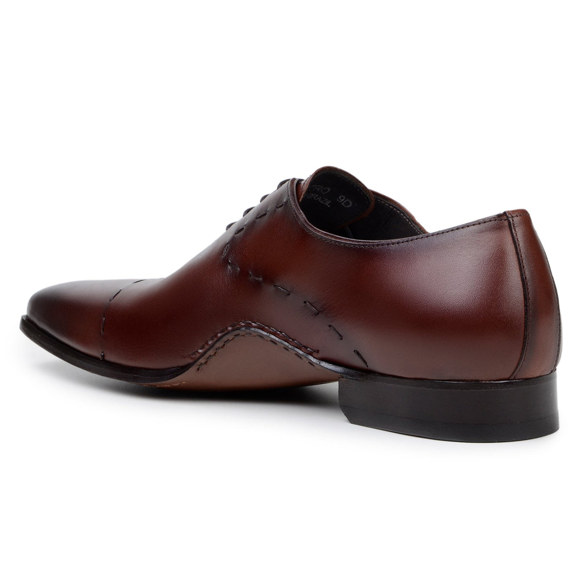 Rear three-quarter view of antique cognac calf leather Maestro Oxford