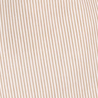 Close-up detail of tan seersucker stripe fabric texture and pattern