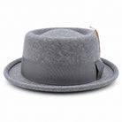 grey pork pie wool felt hat by Montique front view with grosgrain bow and multicolor feather accent