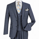 Three-quarter view of men’s grey windowpane three-piece suit showing the two-button jacket and matching vest