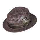 Brown Montique fedora hat angled view with open weave crown, wide brim, feather detail, and satin band