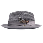Grey Montique fedora hat side view with open weave crown, satin ribbon band, logo pin, and clean white brim