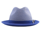Royal blue Montique fedora hat front view with blue ribbon band, white bow accent, woven crown, and Montique logo pin