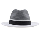 White Montique fedora hat front view with black and white woven crown, black band, white stripe detail, and solid white brim