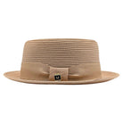 Camel pork pie hat side view with matching bow, Montique logo pin, woven crown, and short brim